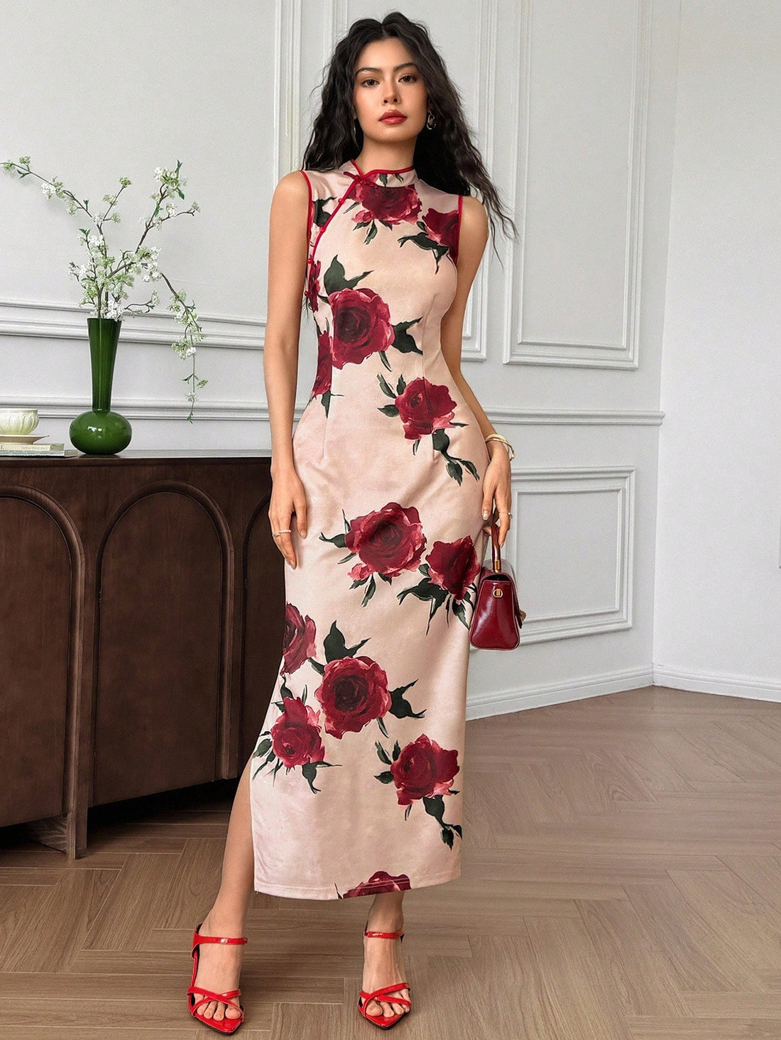 Turn heads with this Elegant Floral Print Sleeveless Fitted Midi Dress, designed to flatter your curves with a chic button detail down the front. Perfect for sunny days or garden parties, its playful floral pattern and sleek silhouette add a touch of effortless charm to your wardrobe. Feel confident and stylish wherever you go!