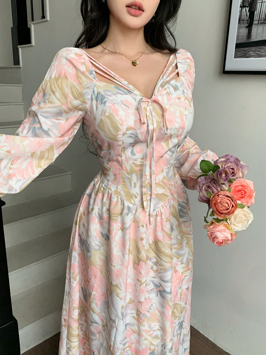 Twirl into summer with our floral print dress that's as fun as it is flattering! The cinched waist creates a gorgeous silhouette, while long sleeves add just the right amount of sophistication. Perfect for garden parties or brunch dates where you want to turn heads and collect compliments. This dress doesn't just look good—it makes you feel fabulous!