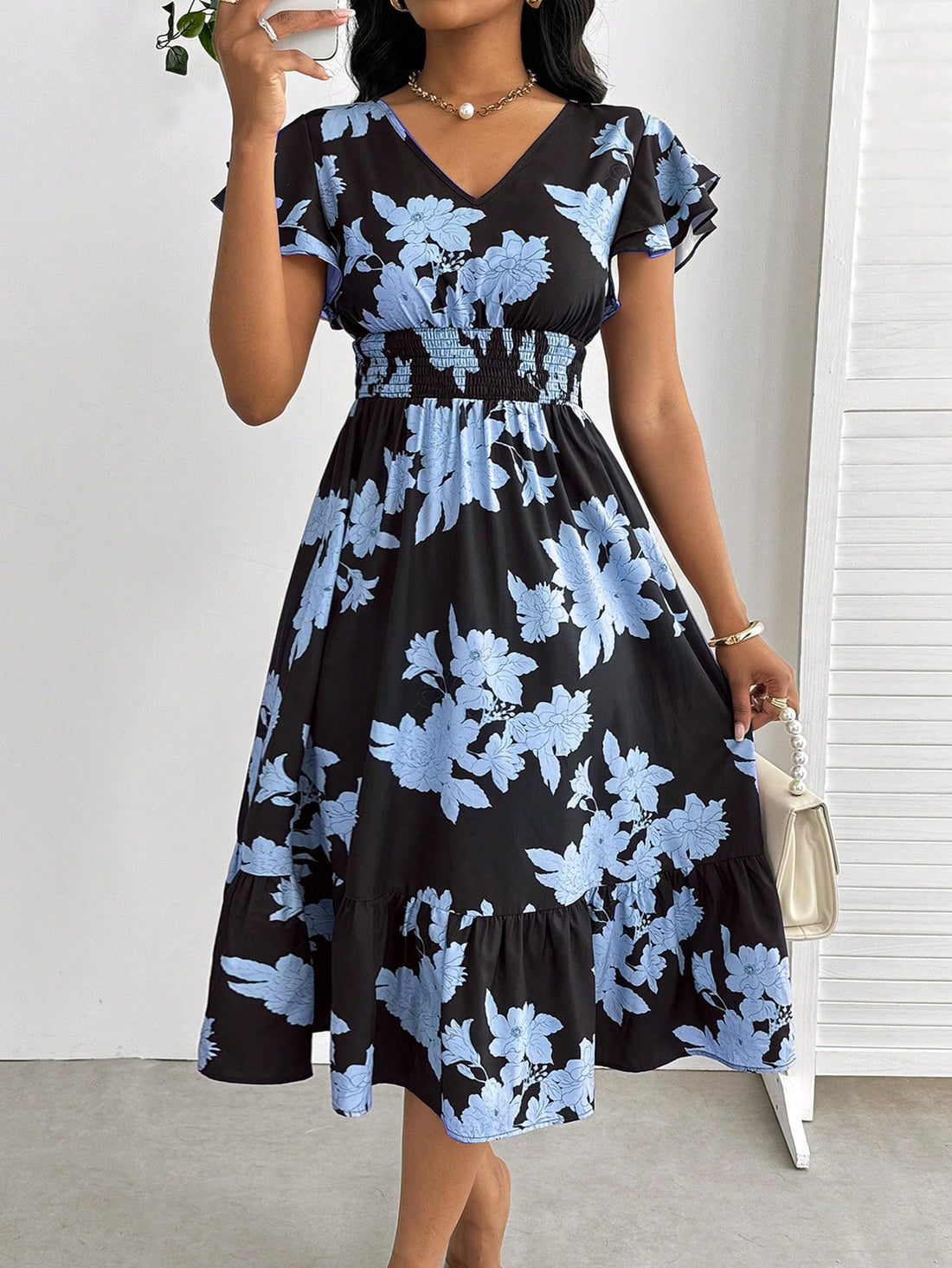 Introducing our Elegant Floral Print Wedding Guest Dress! With delicate lotus leaf sleeves and a versatile design, this dress is perfect for any special occasion. The elegant floral print adds a touch of femininity, making you the best dressed guest. (Weddings, parties, D&D, you name it)!