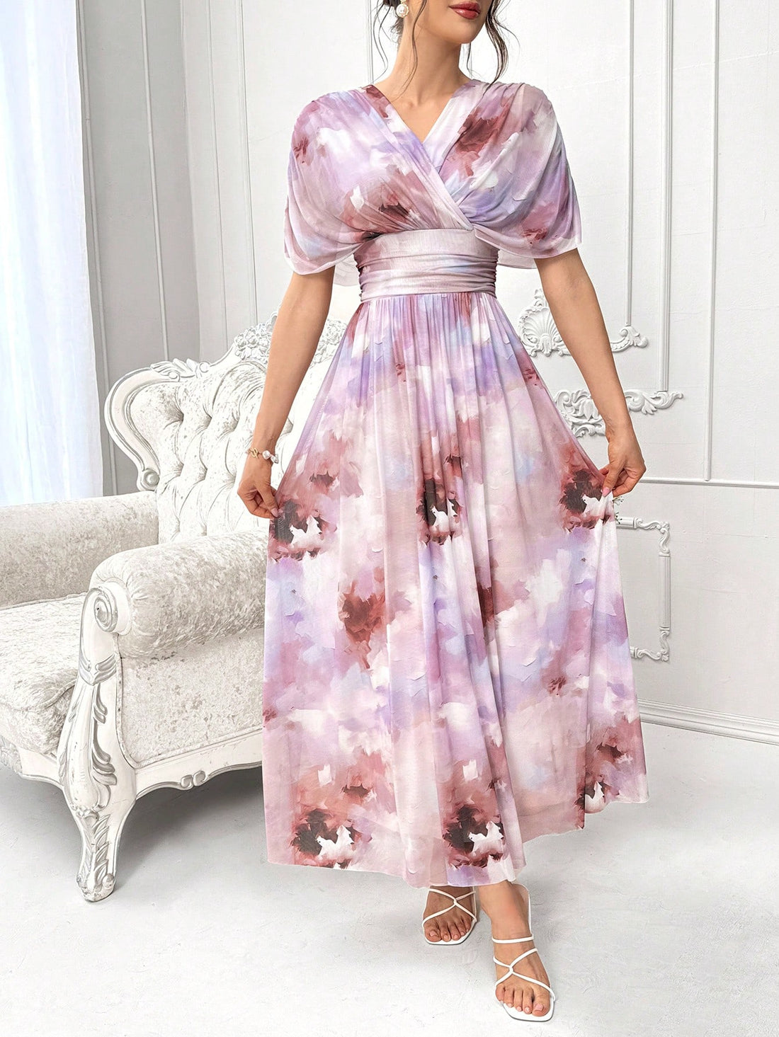 Get ready to turn heads in this Elegant Floral Printed Batwing Sleeve Dress! With its eye-catching design and lightweight fabric, this dress is perfect for summer evenings. Elevate your fashion game and stand out in the crowd with this stylish piece. Feel confident and beautiful in this unique dress.