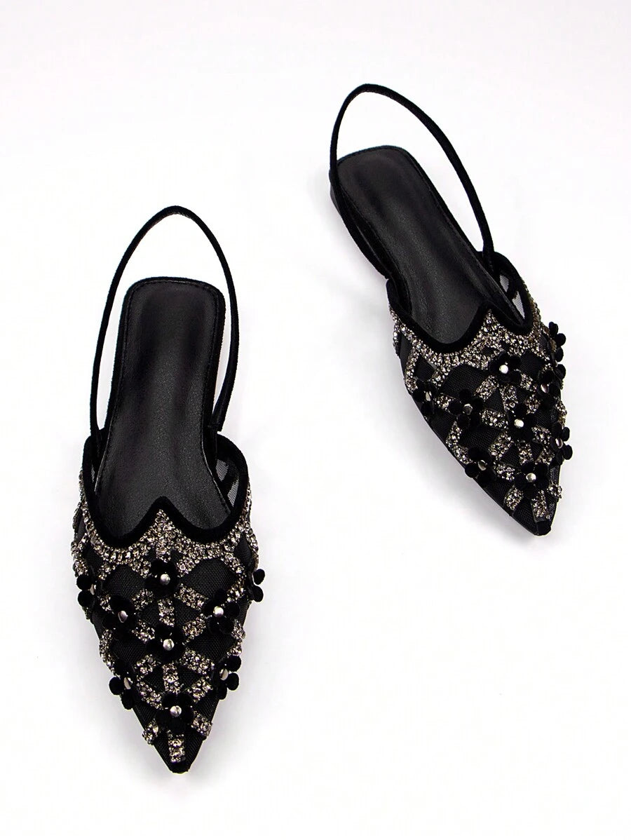Step into charm with these Elegant Floral Rhinestone Black Velvet Pointed Toe Mule Slippers. Their soft velvet and sparkling rhinestones add a touch of glam to your daily comfort or party look. The pointed toe design keeps things sleek and stylish, making every step feel like a celebration. Perfect for lounging or dancing the night away!