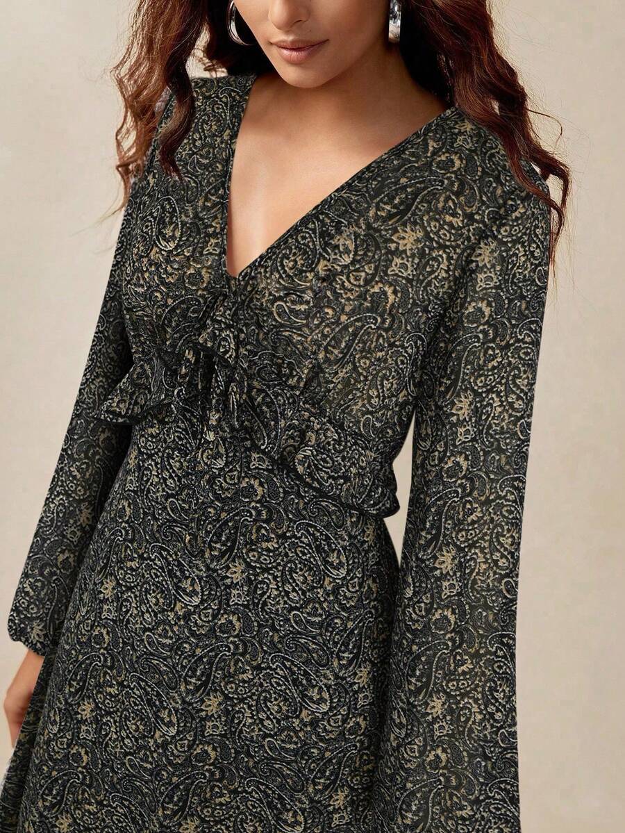 Elevate your wardrobe with this stunning boho-inspired dress featuring an elegant paisley floral print and graceful ruffle hem. The cinched high waist flatters your silhouette while bishop sleeves and flowing A-line cut create effortless sophistication. Crafted from lightweight chiffon with a lined interior, this versatile piece transitions seamlessly from formal occasions to evening celebrations. Perfect for special events and festivals, the V-neckline and all-over print design make a refined statement. Ma