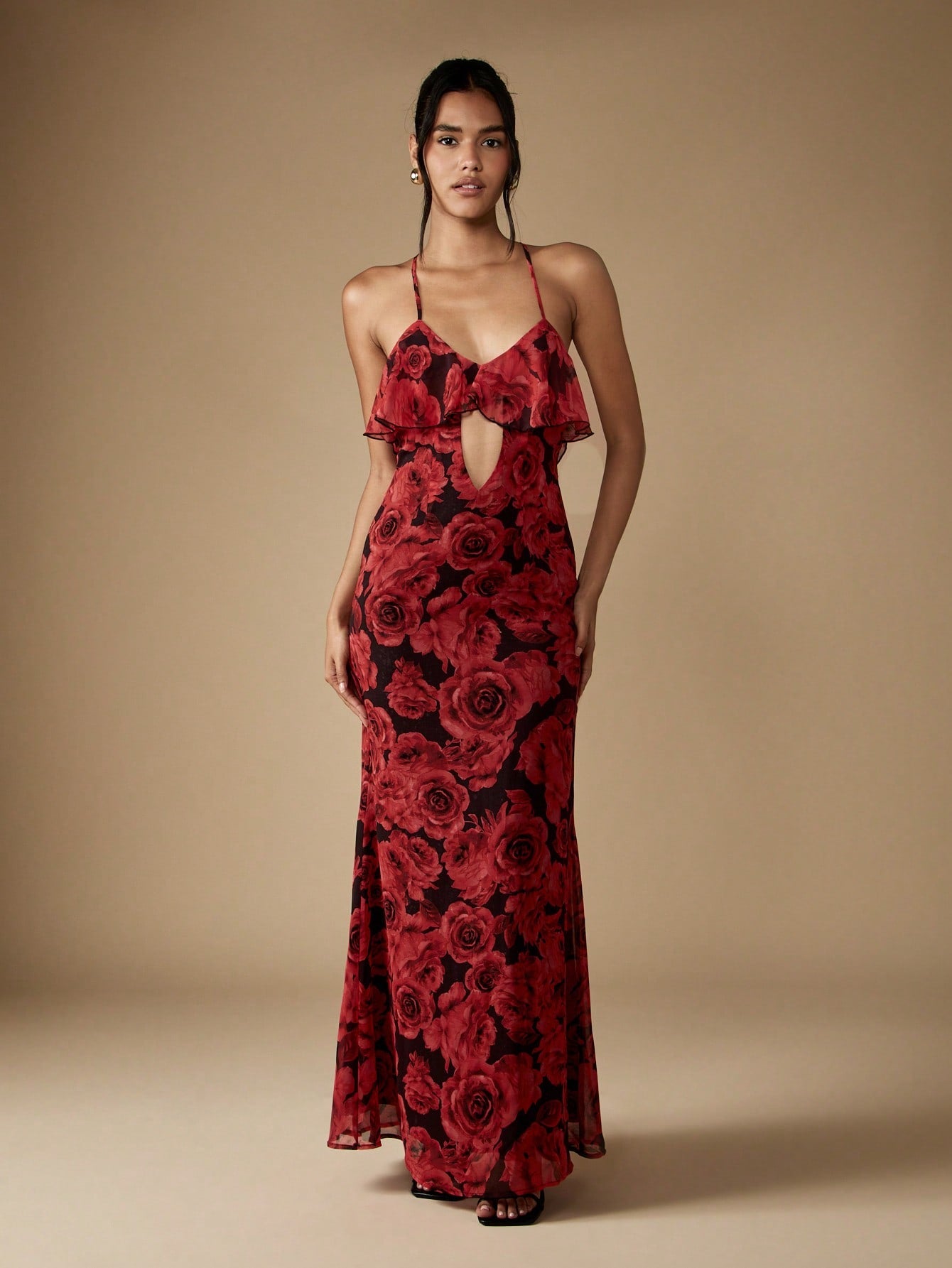 Step into celebration mode with this Elegant Floral Ruffle Maxi Dress, designed to turn heads at weddings and special occasions. Its playful ruffles and charming cut-out detail add a flirty twist to classic elegance. Lightweight and flowing, it moves beautifully with every step, making you the life of any party. Perfect for dancing, twirling, and making unforgettable memories in style.