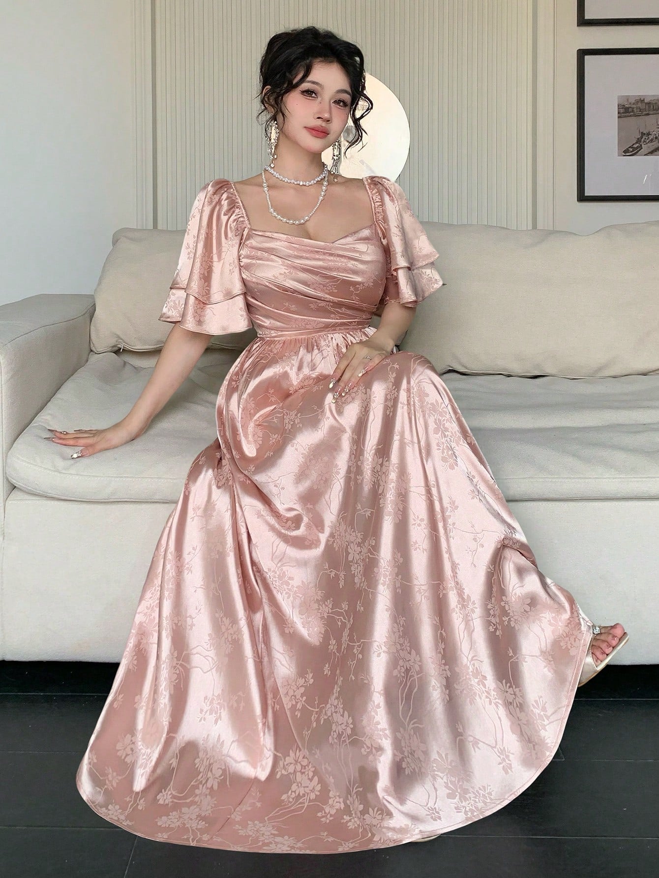 Step into the spotlight with this Elegant Floral Satin Wedding Party Dress! Its smooth satin finish and delicate floral pattern bring a touch of romance, while the chic square neck and playful pleated design add a modern twist. Perfect for dancing the night away or stealing the show, this dress makes every moment feel like a celebration.