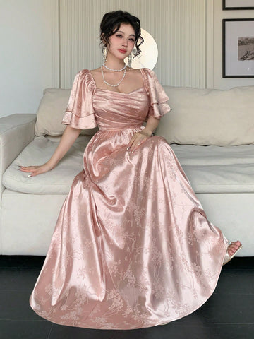 Step into the spotlight with this Elegant Floral Satin Wedding Party Dress! Its smooth satin finish and delicate floral pattern bring a touch of romance, while the chic square neck and playful pleated design add a modern twist. Perfect for dancing the night away or stealing the show, this dress makes every moment feel like a celebration.