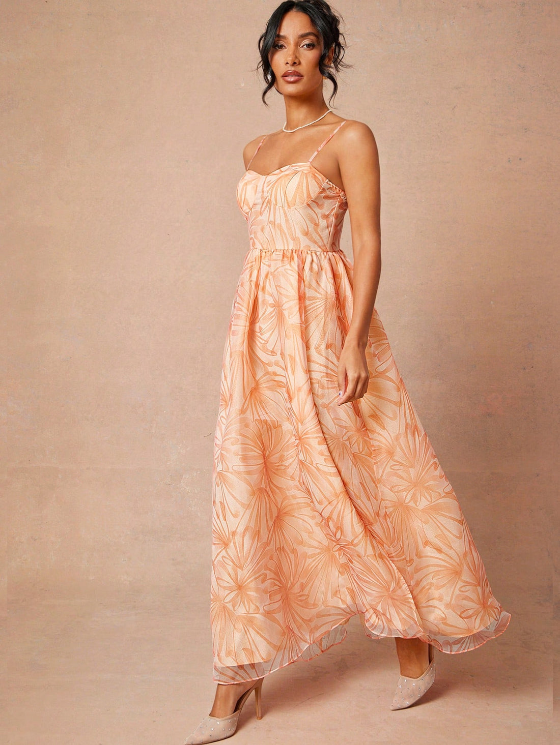 Step into sunshine with this Elegant Floral Sweetheart Maxi Dress—your ultimate summer vacation companion. Flowing fabric meets a flirty sweetheart neckline, creating a breeze of effortless charm. Whether you're strolling the beach or sipping sunset cocktails, this dress combines comfort and style to keep you feeling fabulous all day long. Embrace your inner flower child and make every moment bloom!