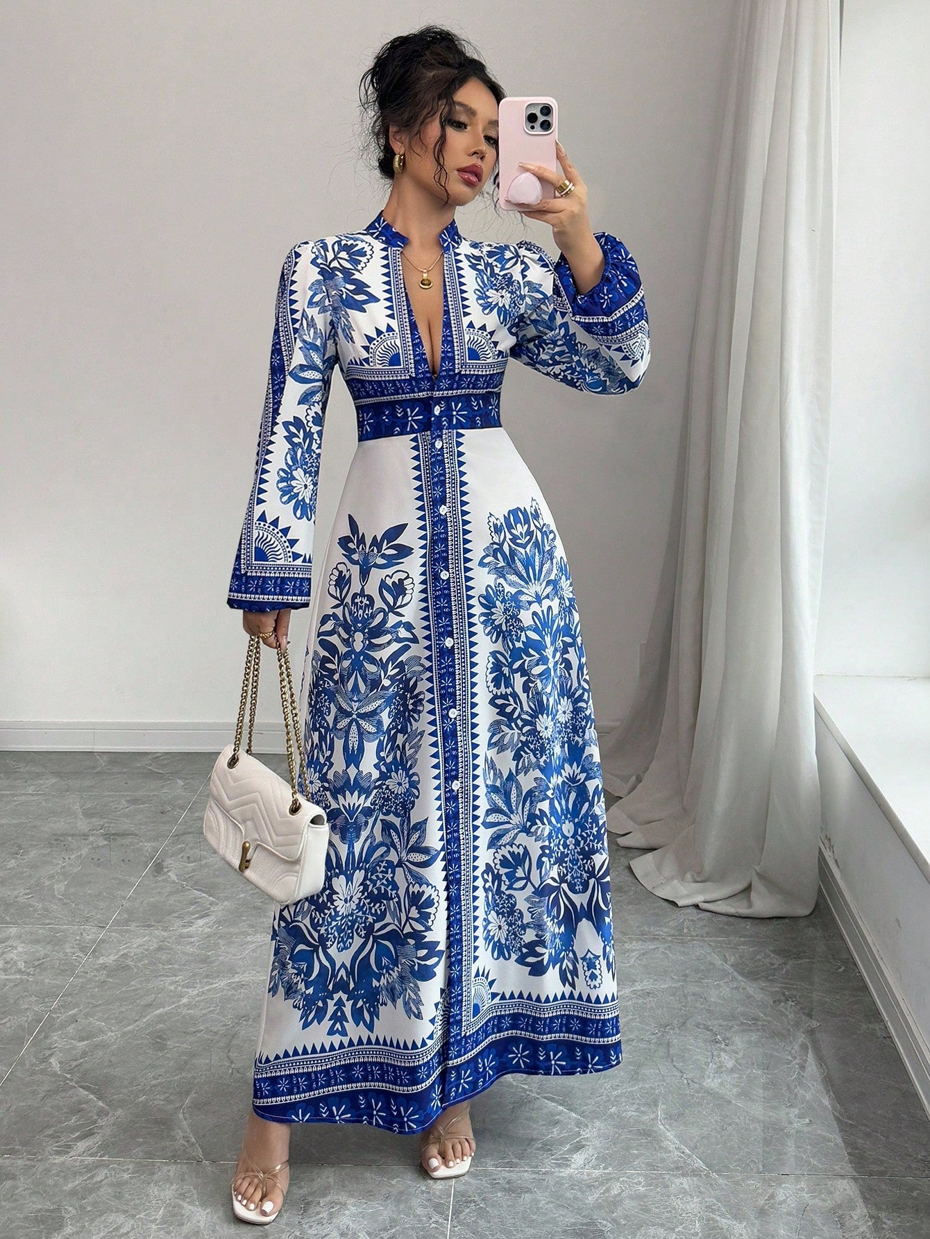 Spruce up your wardrobe with our Elegant Floral V-Neck Midi Dress! This chic dress features delicate buttons and a flattering v-neck, perfect for any occasion. Stay stylish and comfortable with this floral dress that will have you feeling confident all day long.