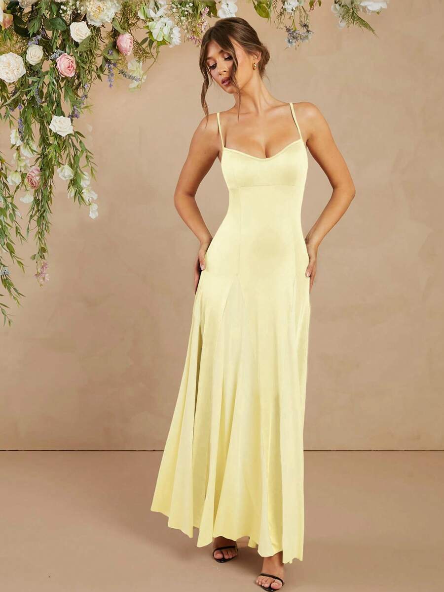 Step into summer celebrations with this elegant flowing maxi dress, designed just for wedding guests who want to shine! Featuring delicate spaghetti straps and a graceful silhouette, it offers breezy comfort while turning heads. Whether you're dancing under the stars or sipping champagne, this dress combines effortless style with flattering movement for your perfect sunny-day look.