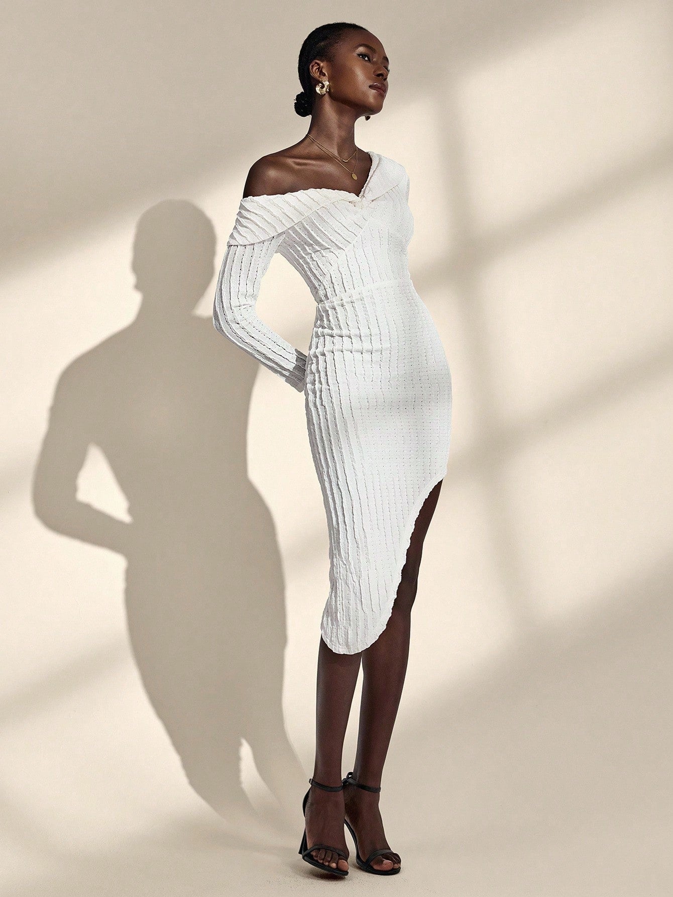 Bonjour! Here's your product description: Ooh là là, this isn't your average dress! Our French-inspired asymmetrical hem dress brings that effortless Parisian charm with a playful twist. The unique shoulder design catches eyes while the mid-length cut keeps things chic and wearable for any occasion. Whether you're heading to brunch or a night out, this dress proves that a little asymmetry goes a long way. Très magnifique!