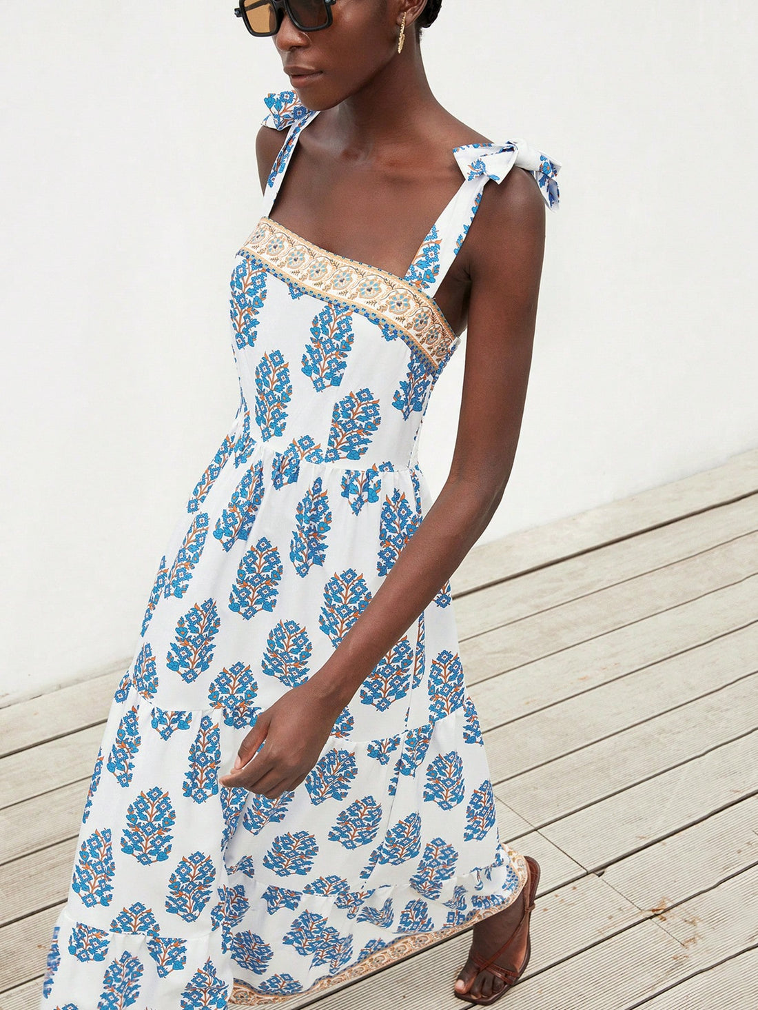 Step into effortless charm with this Elegant French Chic A-Line Dress. Featuring a delicate floral print and slender spaghetti straps, it’s perfect for turning heads on your next stylish getaway. Light, breezy, and flattering, this dress brings a playful touch of Parisian flair to your vacation wardrobe.