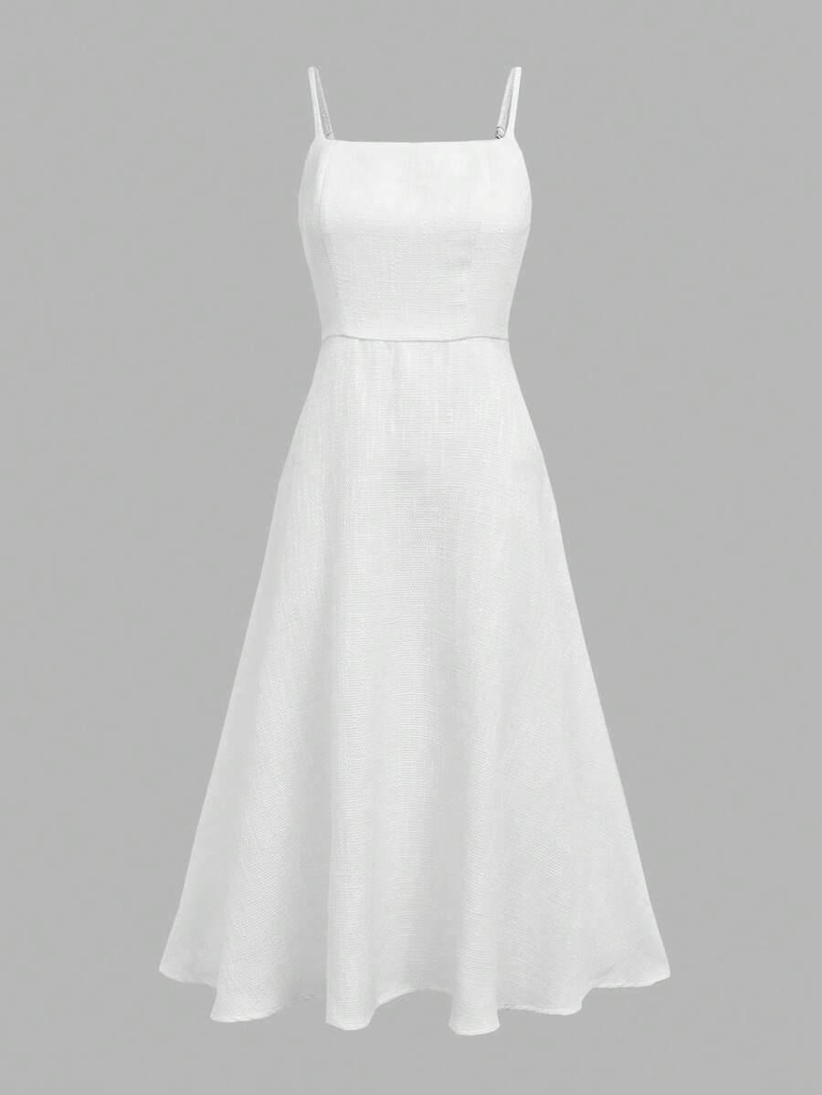 Front View Of Cami Dress in white with flared midi skirt for wedding and office styling