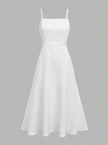 Front View Of Cami Dress in white with flared midi skirt for wedding and office styling