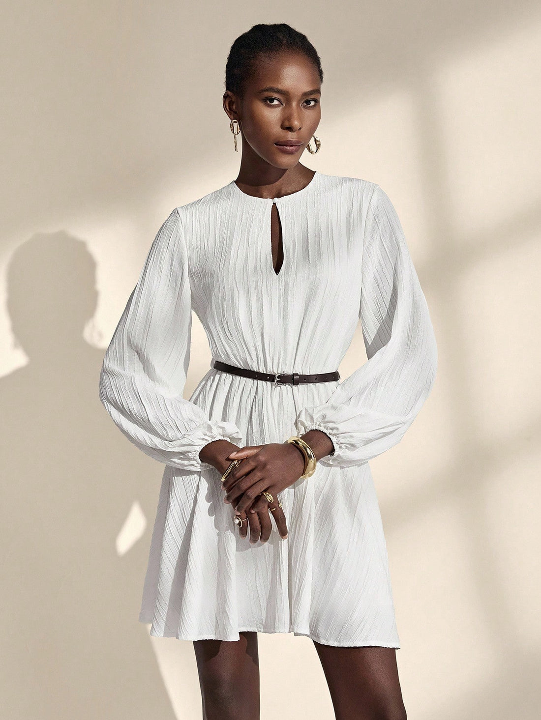 Twirl into romance with this enchanting white dress that whispers elegance at every turn. The dreamy lantern sleeves add a touch of whimsy and vintage charm, while the refined silhouette flatters effortlessly. Crafted with a French-inspired aesthetic, this versatile piece transitions seamlessly from crisp autumn days to breezy spring afternoons. Whether you're strolling through gardens or attending a special gathering, this dress captures that magical je ne sais quoi that makes you feel absolutely fabulous.