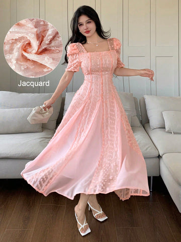 Twirl into elegance with this French-inspired square neck dress! The jacquard fabric adds a touch of luxury while the flared waist creates a flattering silhouette that's perfect for dancing the night away. This long dress combines timeless sophistication with playful charm – because who says fancy can't be fun?