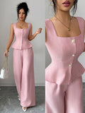 Embrace timeless elegance with this French-inspired two-piece set. The sophisticated square neck crop top features a refined silhouette, while high-waisted wide-leg pants create a flattering, elongated line. Crafted from 100% polyester woven fabric in a soft pink hue, this versatile ensemble transitions seamlessly from office to special occasions. The asymmetrical details and subtle button accents add understated sophistication. 