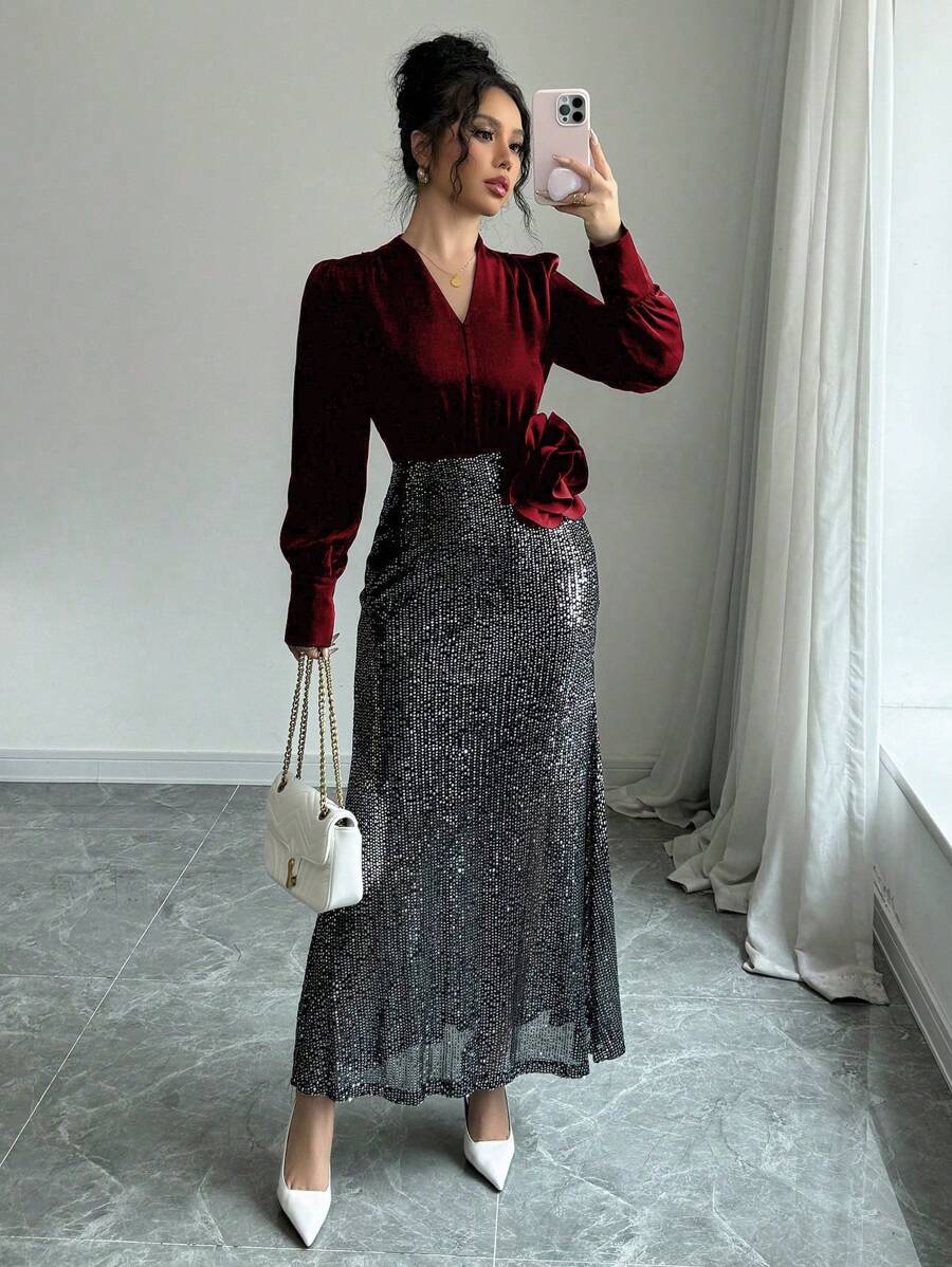 Step into the spotlight with this playful yet sophisticated V-neck dress, sparkling with delicate sequins and charming 3D rose details. Perfect for cozy fall or winter nights, it blends classic French elegance with a touch of whimsy, making every moment feel like a celebration. Whether at a festive party or a chic dinner, this dress promises to turn heads and bring a smile!