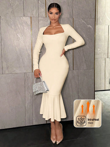 Get ready to turn heads with our Elegant Fuzzy Mermaid Midi Dress. Made with cozy chic fabric, this dress combines style and comfort in one luxurious package. The mermaid silhouette and midi length create a flattering look, perfect for any occasion. Elevate your wardrobe with this must-have piece.