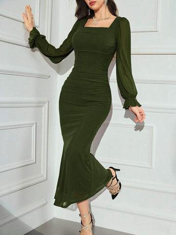 Step into autumn evenings with this playful, elegant dress featuring a flattering gathered waist and a charming square neckline. Its long, flowing silhouette adds a touch of grace, perfect for cozy nights out or festive gatherings. Embrace style and comfort effortlessly in this must-have seasonal piece.