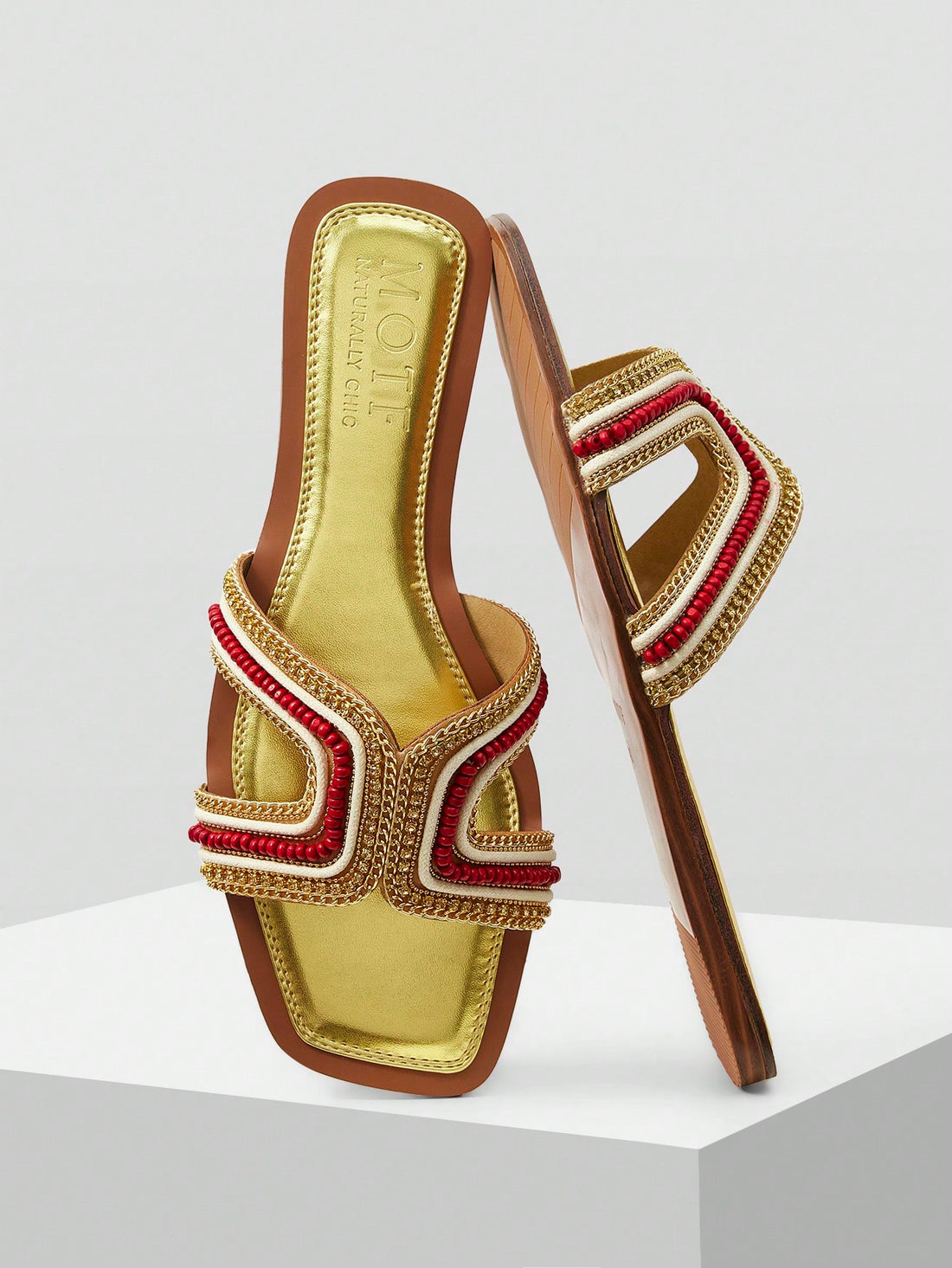 Step into sunshine and sparkle with these Elegant Gold Color Holiday Flat Sandals for Women. Perfect for adding a touch of glam to your casual looks, their shimmering gold finish pairs effortlessly with any outfit. Lightweight and comfy, they keep your feet happy while you dance through your holiday adventures. Shine bright and stay playful wherever you go!