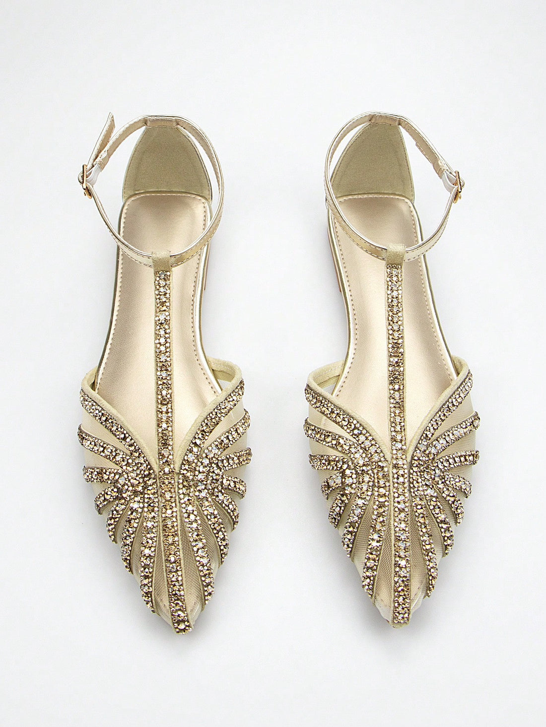 These Elegant Gold Rhinestone-Embellished Flat Shoes are the perfect addition to any wardrobe. The ankle strap provides a secure fit while the rhinestone embellishments add a touch of glamour. Ideal for both daily wear and special occasions, these shoes are a must-have for any fashion-forward individual.