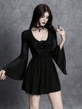 Front view of black gothic A-line mini dress with 3D rose appliqué and sheer bell sleeves