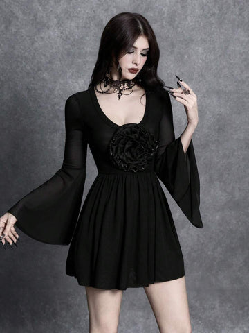 Front view of black gothic A-line mini dress with 3D rose appliqué and sheer bell sleeves
