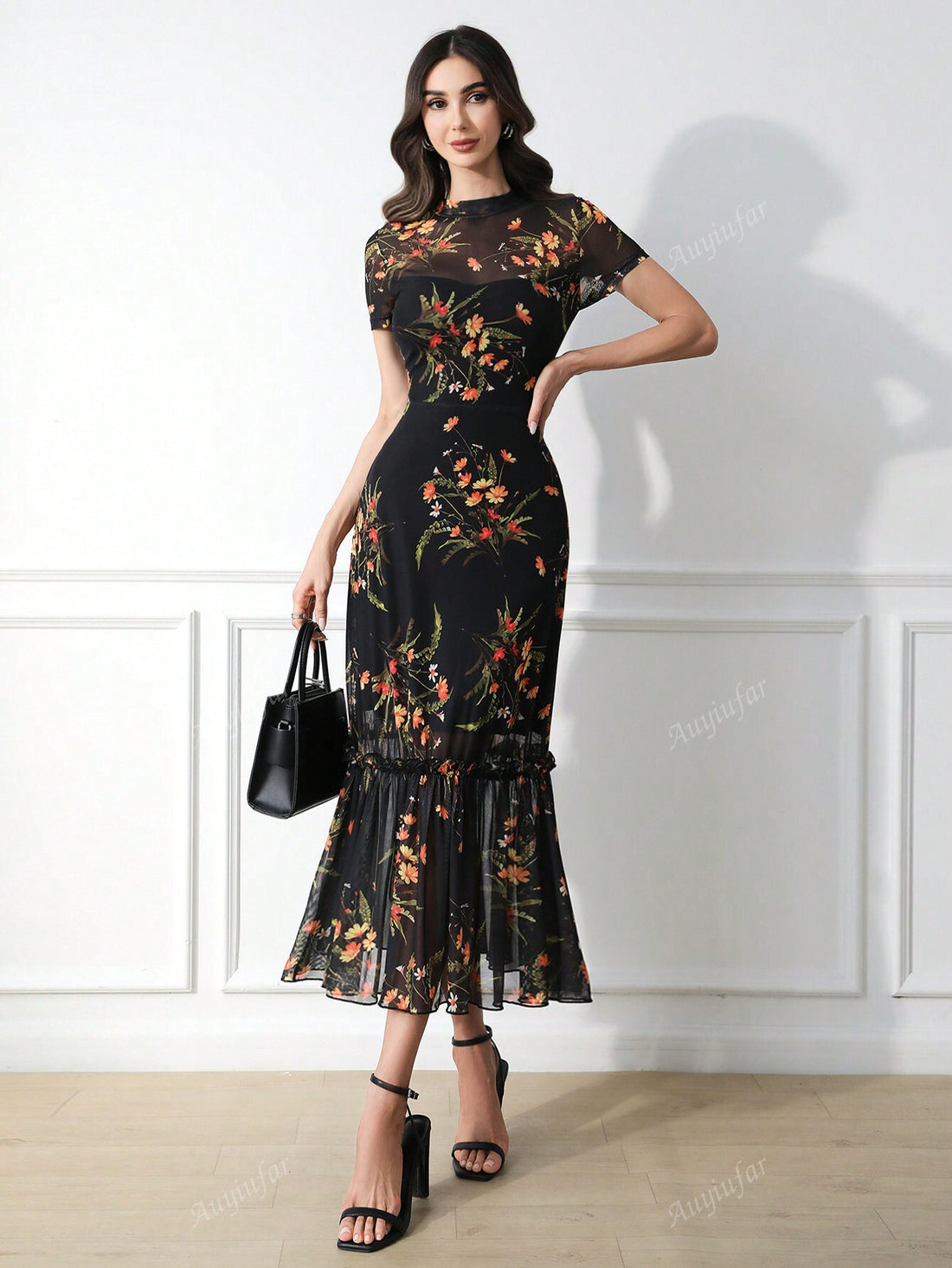 Unleash your inner gothic goddess with this Elegant Floral Print Mesh Dress. Designed with a cinched waist and a playful wave hem, this dress flatters your figure and adds a touch of edgy elegance to your wardrobe. Embrace your unique style and stand out in this dress!