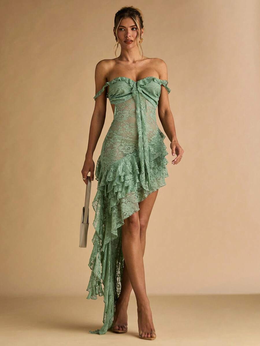 Embrace effortless summer elegance with this stunning backless dress in rich green. The delicate 3D floral lace detailing adds texture and sophistication, while the charming ruffle trim frames the neckline beautifully. The open back design creates a graceful, romantic silhouette perfect for warm-weather occasions—from garden parties to evening events. Lightweight and breathable, this dress moves with you while maintaining its polished appeal. A versatile piece that transitions seamlessly from day to night.