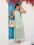 Step into vacation mode with this playful green halter maxi dress. Featuring a flirty ruffle hem and an open back, it combines elegance with breezy comfort. Perfect for sunny days and warm nights, this dress lets you move freely while turning heads wherever you go.