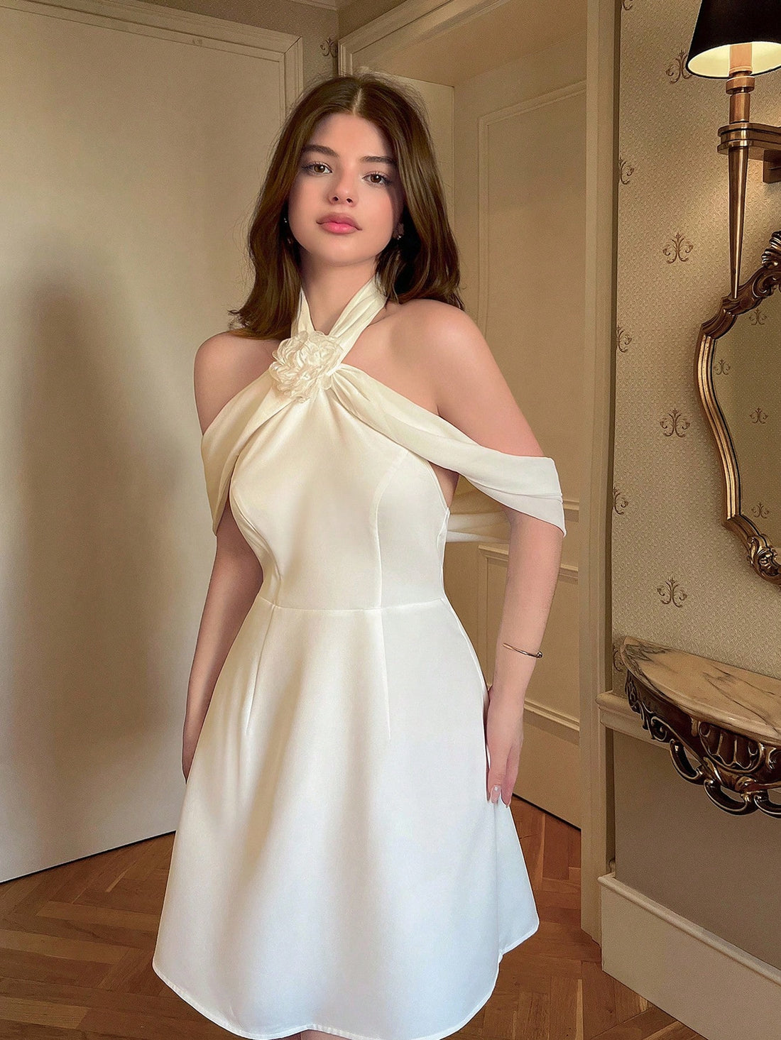 Turn heads this spring and summer with this playful halter backless mini dress, bursting with vibrant floral patterns perfect for Derby days or sunny outings. Its flirty cut highlights your shoulders and back, while the breezy design keeps you cool and stylish all day. Feel confident and festive wherever you go with this charming, race-ready dress.