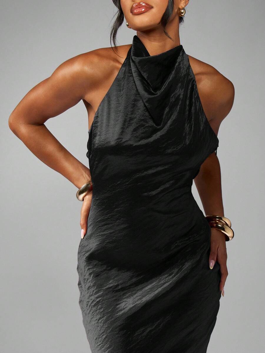 Step into the spotlight with this Elegant Halter Neck Satin Evening Gown. Its floor-length silhouette flows gracefully, perfect for twirling on the dance floor at weddings or special events. The halter neck adds a chic touch, while the smooth satin feels like a dream against your skin. Get ready to turn heads and make every moment unforgettable in this stunning gown!