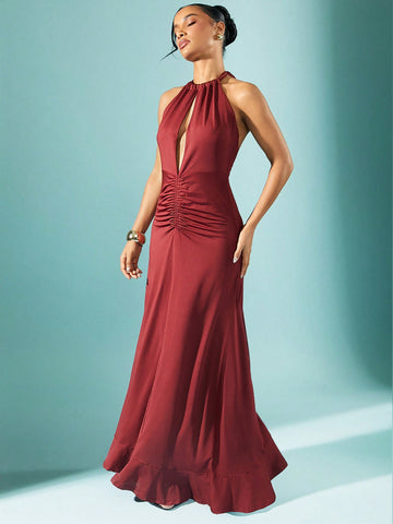 Turn heads with this playful halter neck dress that dances with every step. Its gathered waist flatters your silhouette while the flowy fabric brings effortless elegance to any occasion. Perfect for twirling through summer days or stealing the spotlight at evening events.