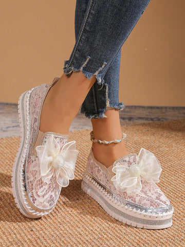 Step into effortless style with these charming handmade floral mesh sneakers. Crafted with breathable mesh fabric, they're perfect for keeping your feet cool during vacations, parties, or everyday adventures. The slip-on design means zero fuss—just slide them on and go. Featuring delicate floral details in a versatile beige tone, these sneakers blend comfort with understated elegance. Whether you're exploring a new destination or dancing the night away, these casual kicks deliver the perfect balance of play