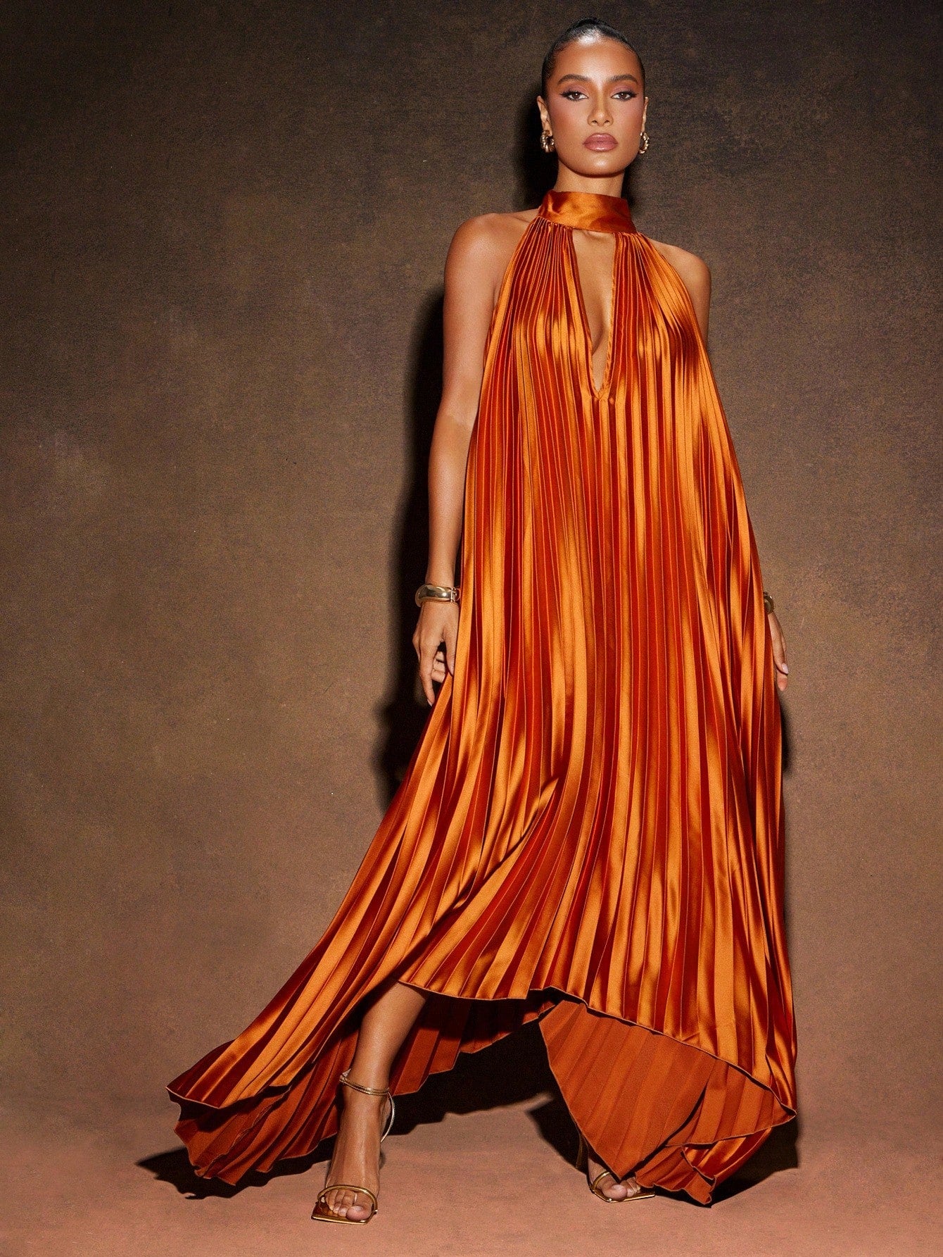 Step into vacation mode with this Elegant High-Low Backless Halter Maxi Dress. Its playful silhouette and breezy backless design keep you cool and chic, while the high-low hem adds a fun twist to your sunny getaway wardrobe. Perfect for beach strolls or evening cocktails, this dress combines effortless style with a dash of flirty charm.