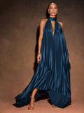 Exude Dramatic Sophistication in Our Elegant High-Low Backless Maxi Dress!

Experience the breathtaking fusion of architectural volume and sharp, modern artisanal tailoring. This stunning backless maxi dress is meticulously designed for the woman who values a high-fashion, 