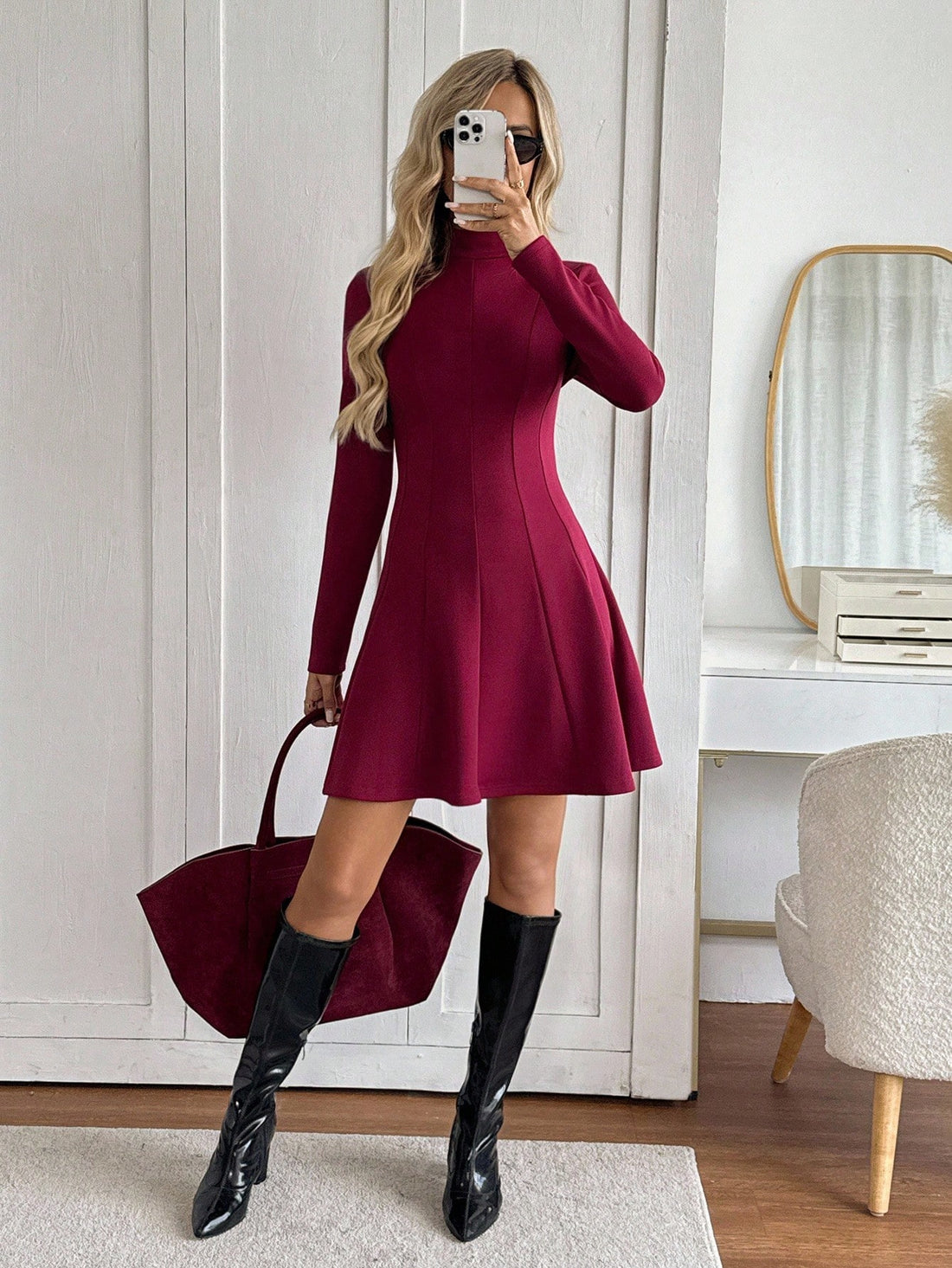 Step into timeless elegance with this stunning wine-hued midi dress that effortlessly blends retro charm with modern sophistication. The graceful A-line silhouette flatters every figure, while the high neckline and long sleeves deliver a polished, put-together look perfect for brunch dates, casual outings, or cozy gatherings. Crafted for comfort and style, this versatile piece transitions seamlessly from day to night, making it a wardrobe essential that'll have you feeling fabulous no matter the occasion.