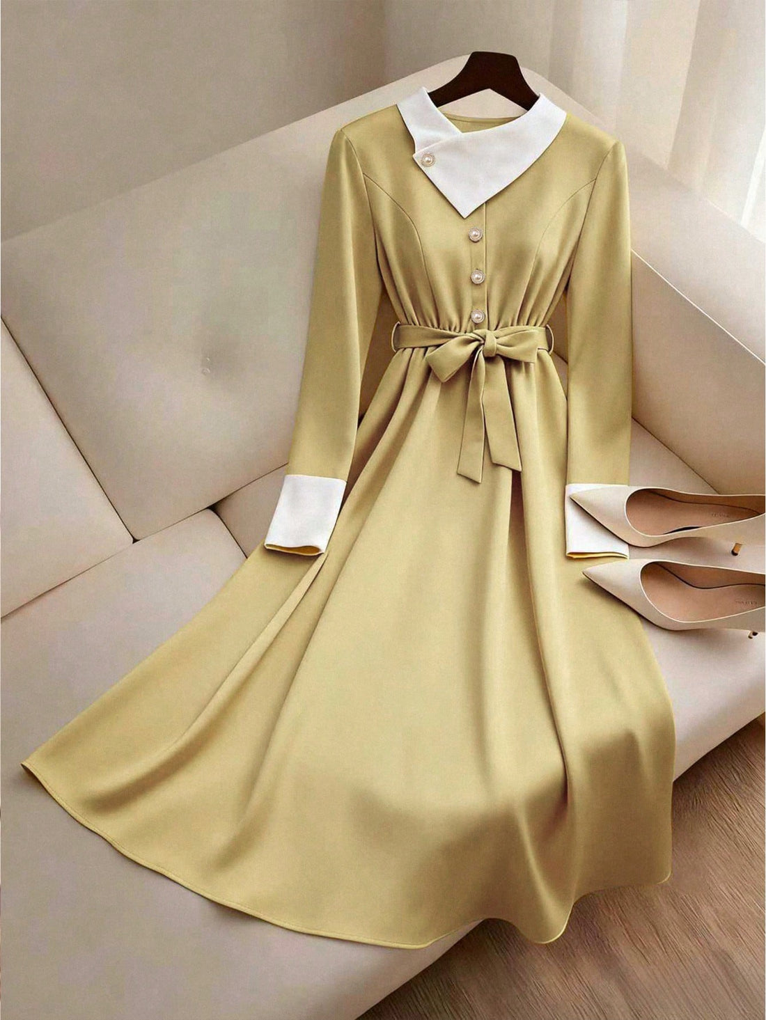 Introducing our Elegant High-Neck Colorblock Winter Dress - the perfect combination of style and comfort for any winter occasion. With a drawstring waist for a flattering fit and a chic colorblock design, this dress will have you looking and feeling your best. Stay warm, stylish, and effortlessly elegant this season!