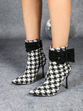 Step out in style with these Elegant Houndstooth High Heel Booties, complete with a stylish zipper detail. Perfect for a night out or adding some flair to your work wardrobe. You'll turn heads and feel confident in these unique and fashionable booties!