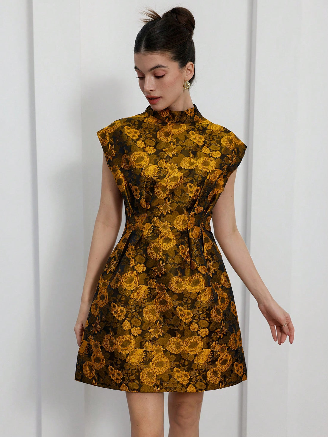 Turn heads in our flirty and charming Elegant Jacquard Mini Dress. With a French-inspired A-line silhouette and short sleeves, this dress is perfect for romantic dates. The elegant jacquard fabric adds a touch of sophistication to your look. Perfect for any occasion, you'll feel effortlessly chic in our mini dress. (Ooh la la!)