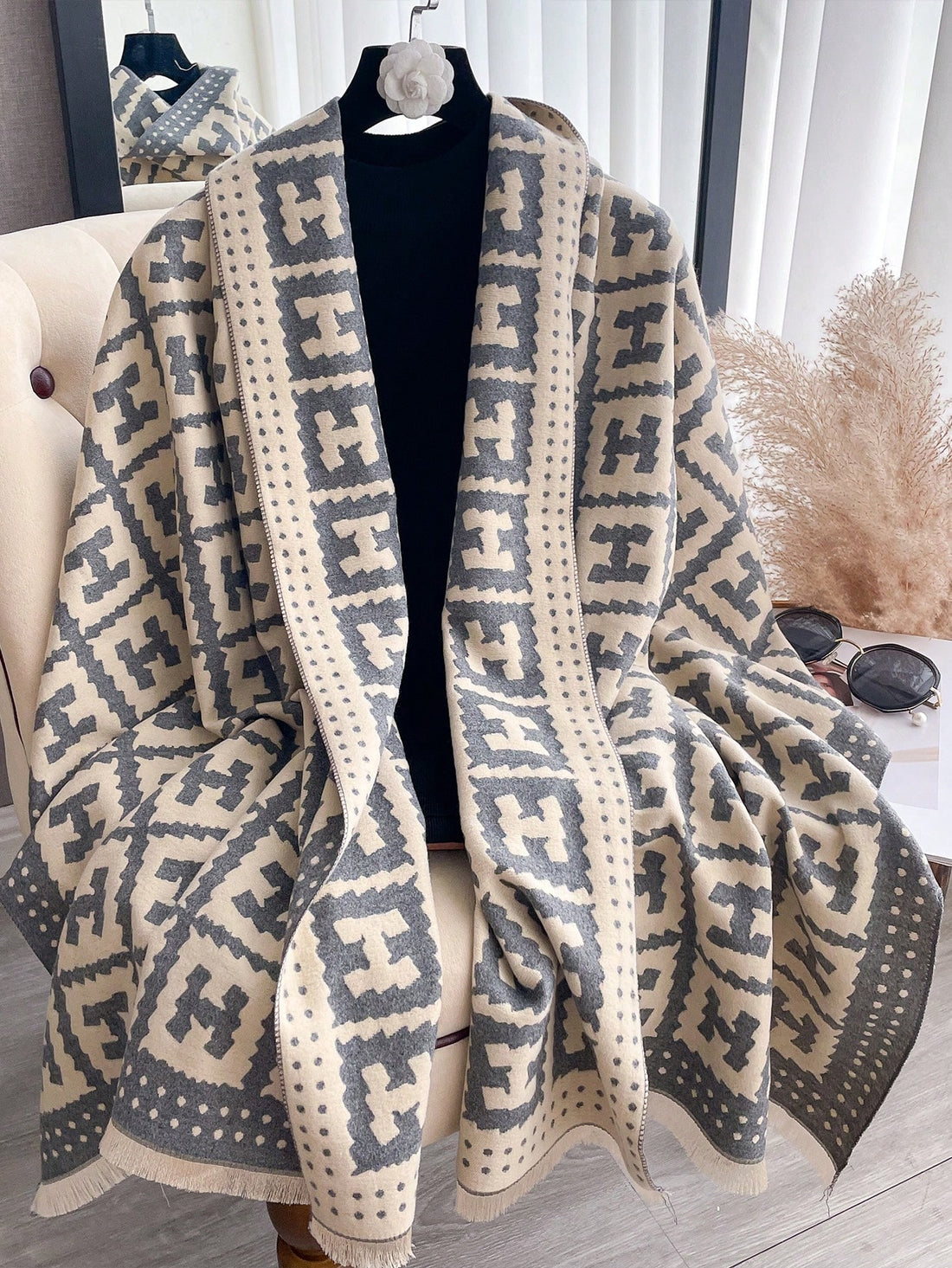 Stay warm and stylish this autumn and winter with our Elegant Jacquard Women's Scarf. Made with chic faux cashmere, this accessory adds a touch of sophistication to any outfit. Its jacquard pattern adds a unique texture, while its soft material keeps you cozy. Upgrade your wardrobe with this must-have scarf.