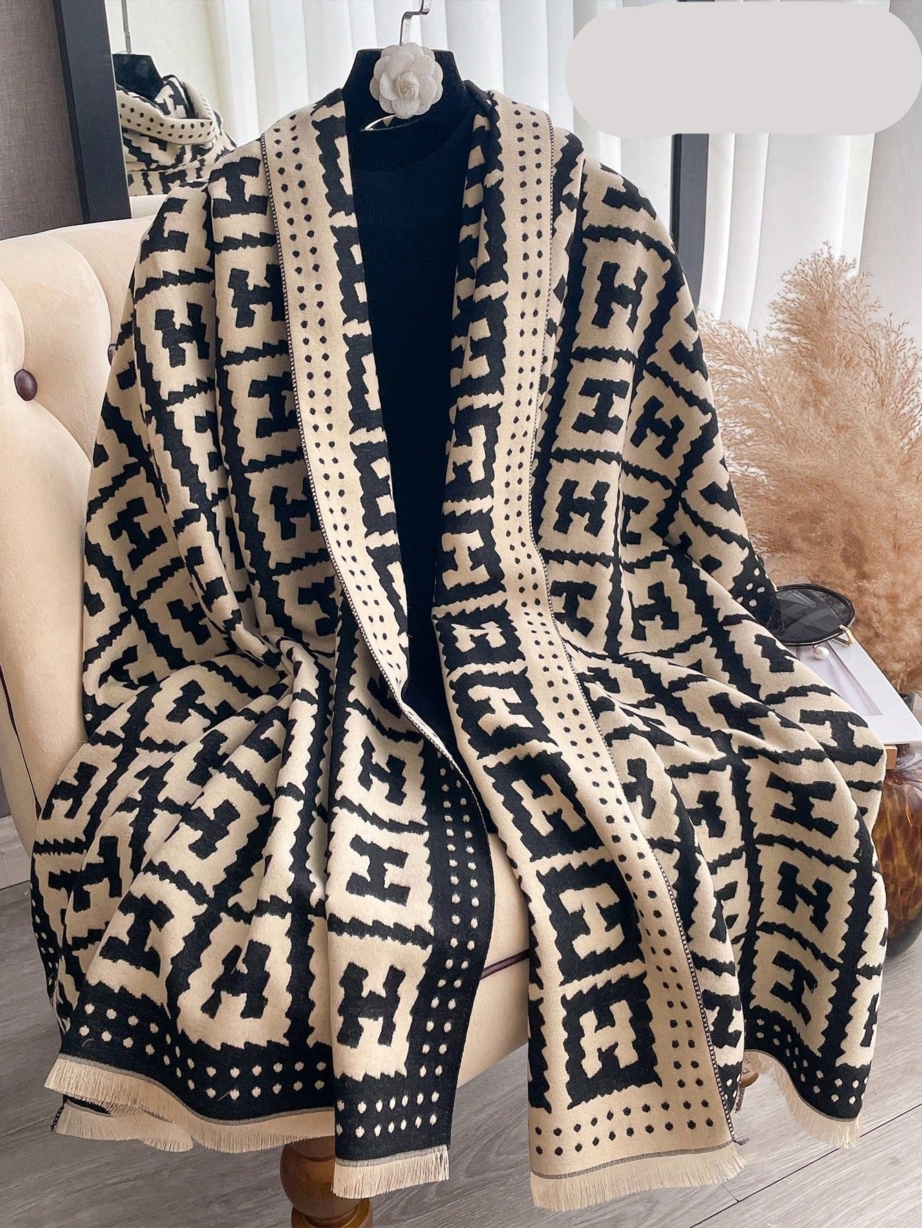 Stay warm and stylish this autumn and winter with our Elegant Jacquard Women's Scarf. Made with chic faux cashmere, this accessory adds a touch of sophistication to any outfit. Its jacquard pattern adds a unique texture, while its soft material keeps you cozy. Upgrade your wardrobe with this must-have scarf.