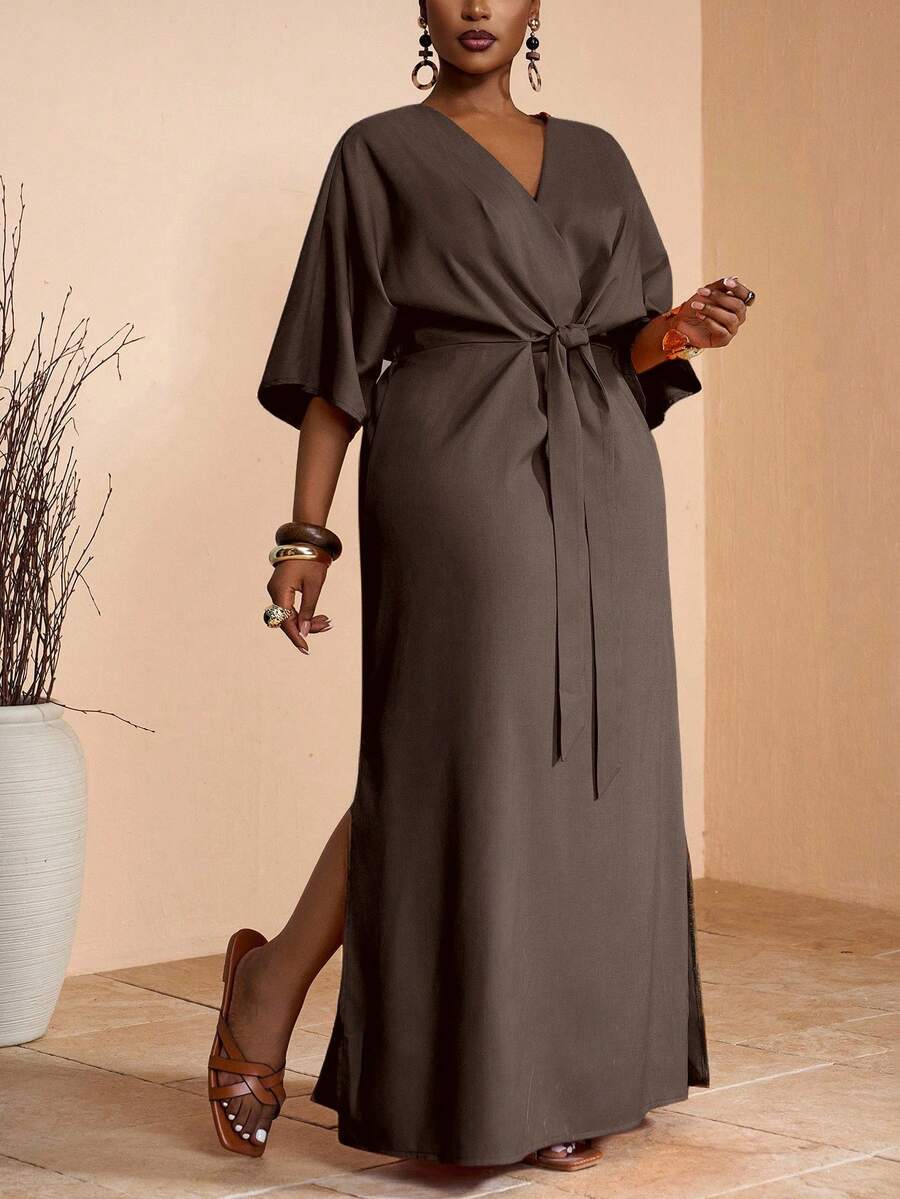 Effortlessly chic meets wonderfully versatile with this khaki maxi dress that's ready for anything. The flattering V-neckline and charming shoulder ties add just the right touch of elegance, while the flowing silhouette keeps you comfortable whether you're lounging by the pool or exploring a new city. Dress it up with heels for evening adventures or keep it casual with sandals for everyday ease. This wardrobe essential transitions seamlessly from vacation mode to your regular rotation—because looking fabulo