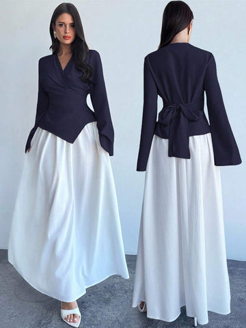 Elevate your wardrobe with this charming two-piece set that effortlessly transitions from office to date night! The wrap waist blouse features flattering draping that cinches at just the right spot, while flare sleeves add a touch of romantic flair. Pair it with the flowing long skirt for a polished, put-together look that turns heads. Crafted in a versatile khaki tone, this set works beautifully with your favorite accessories and shoes. Whether you're impressing at work or stealing hearts over dinner, you'