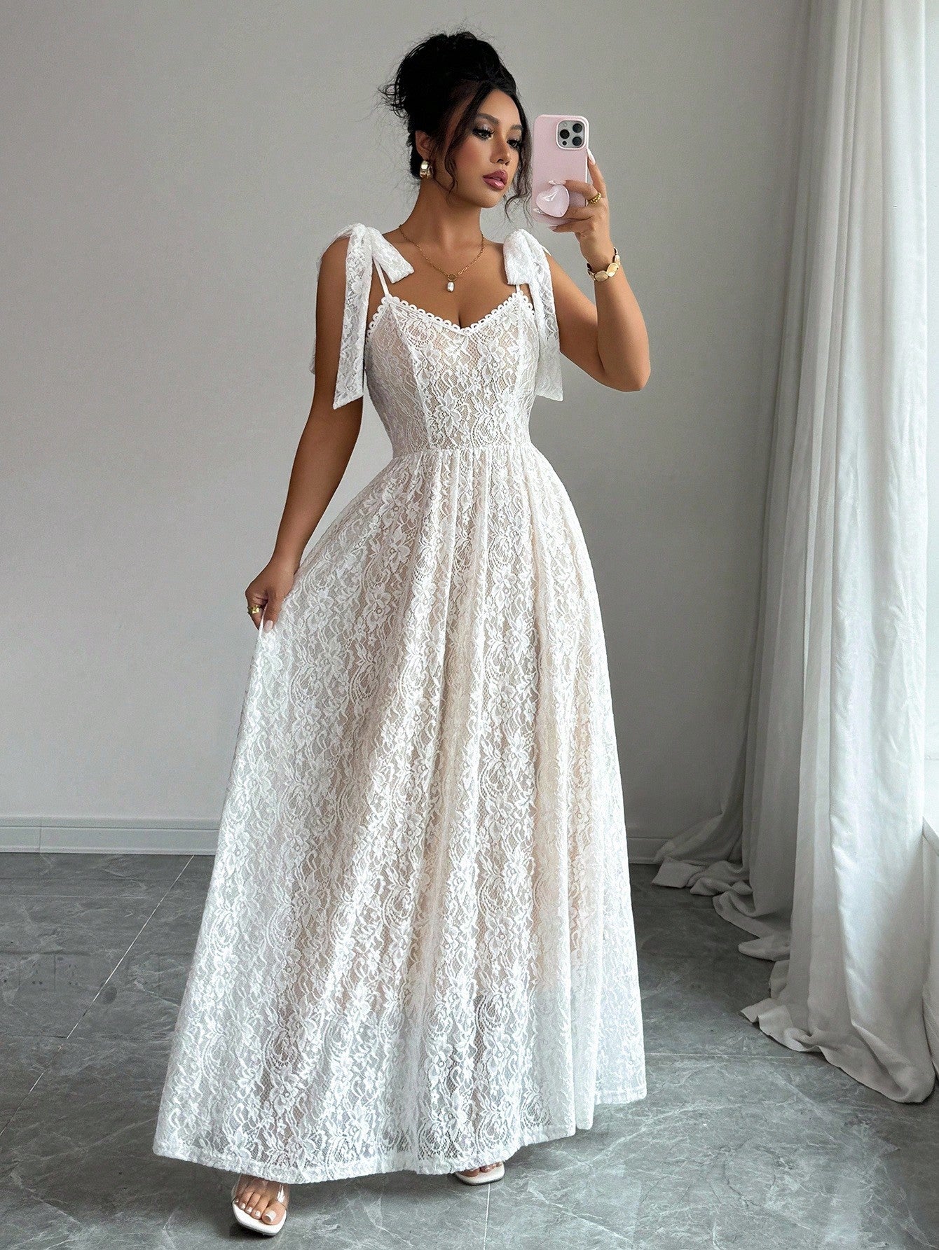 Step into Halloween with a playful twist wearing this Elegant Lace Dress featuring delicate bow-tied shoulders. Its flattering A-line silhouette and spaghetti straps offer both comfort and charm, perfect for a night of fun and flair. Whether trick-or-treating or celebrating with friends, this costume blends elegance with festive spirit effortlessly.