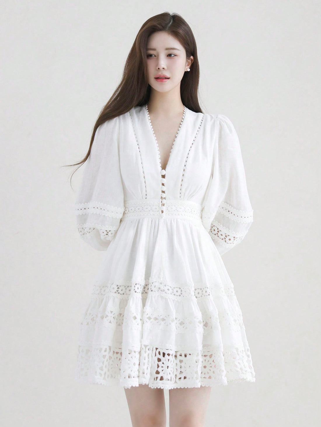 Experience timeless sophistication with our Elegant Lace Patchwork Midi Dress. The intricate lace detailing and patchwork design exude elegance and grace. Crafted with quality materials, this dress offers both style and comfort. Elevate your wardrobe with this versatile and timeless piece.