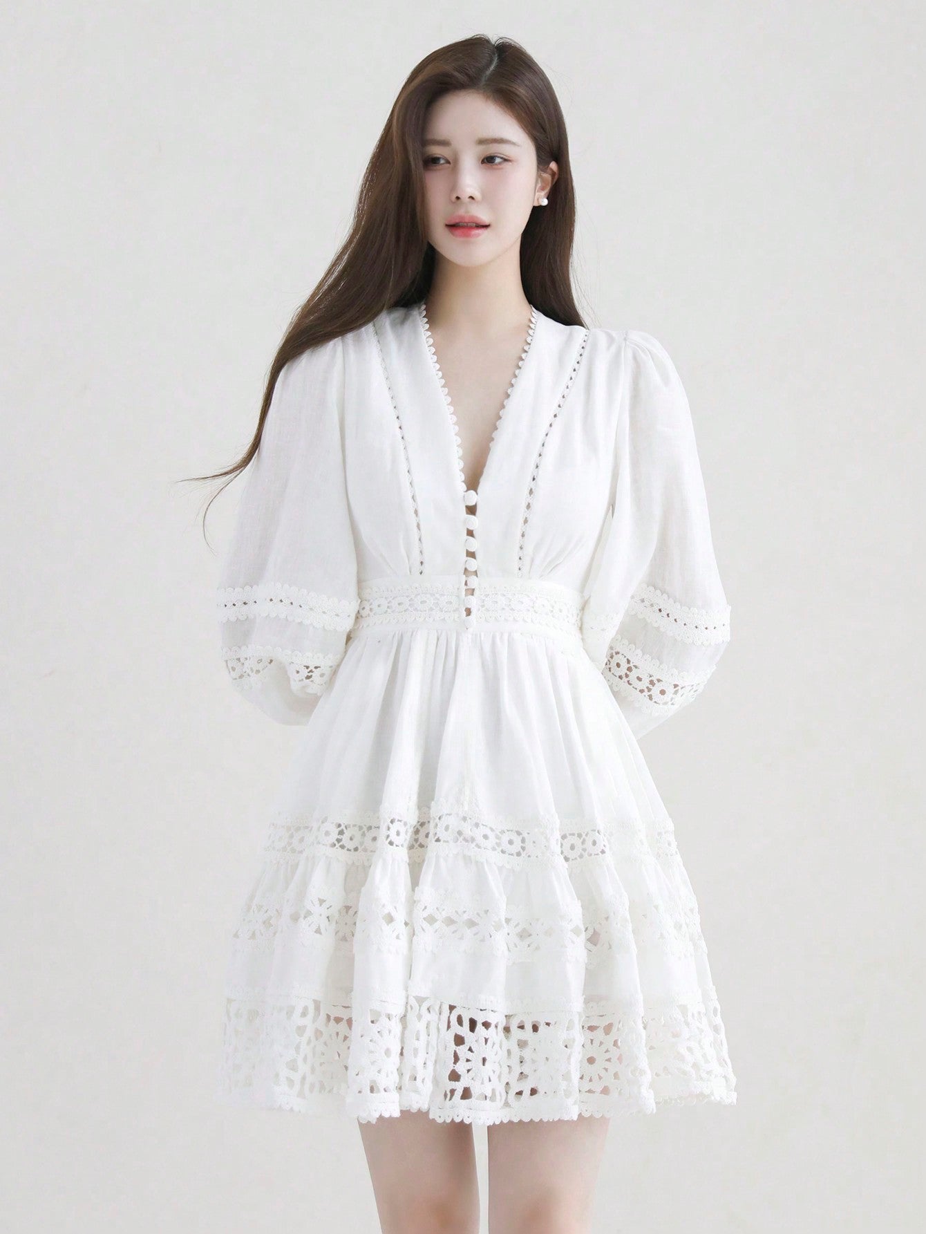 Experience timeless sophistication with our Elegant Lace Patchwork Midi Dress. The intricate lace detailing and patchwork design exude elegance and grace. Crafted with quality materials, this dress offers both style and comfort. Elevate your wardrobe with this versatile and timeless piece.