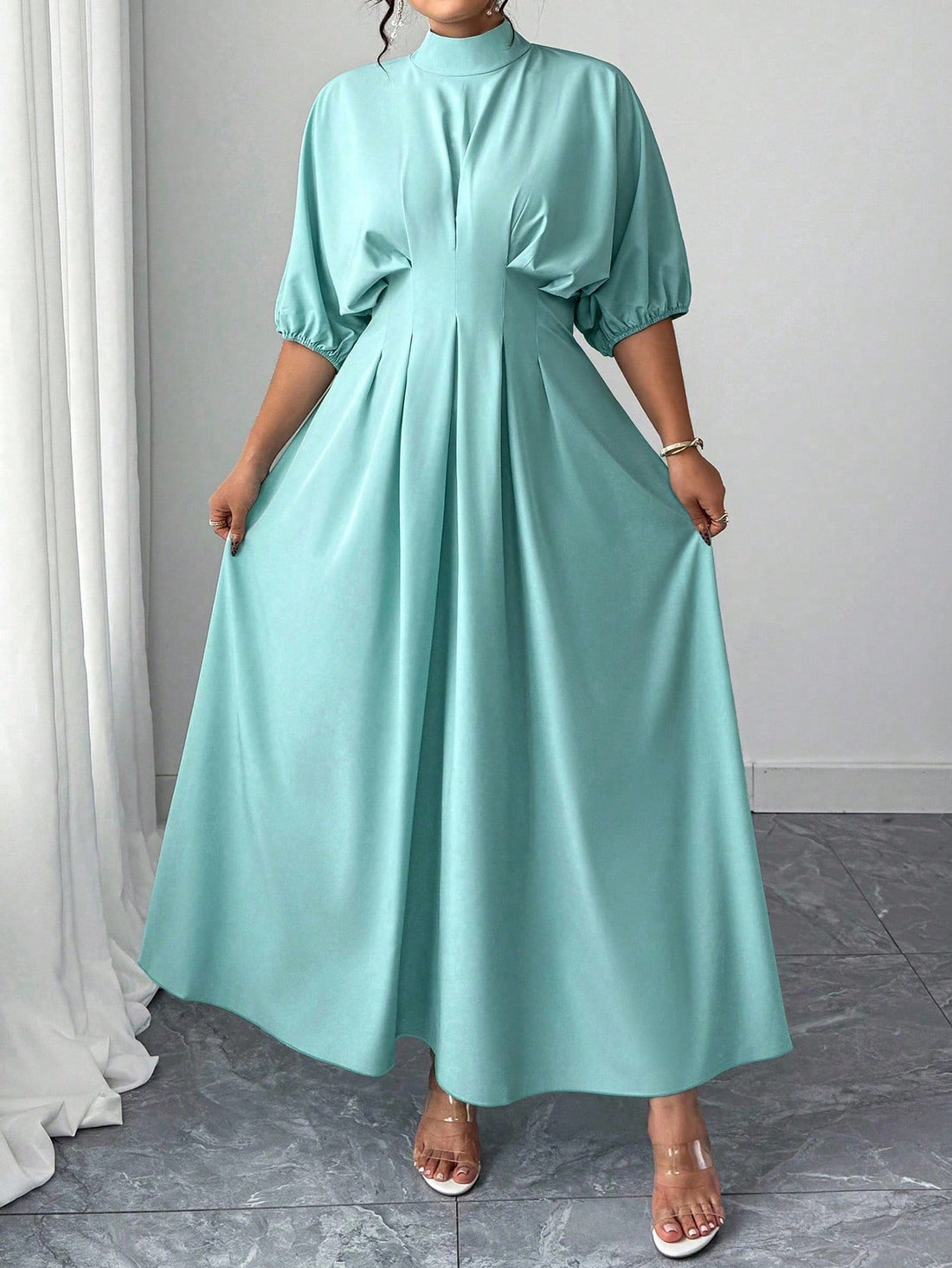 Step into charm with this Elegant Lantern Sleeve Long Dress, featuring playful lantern sleeves and a flattering pleated waist that dances with every move. The round neck design adds a touch of classic grace, making it perfect for both casual outings and special occasions. Embrace effortless style and twirl into your day with confidence and fun!