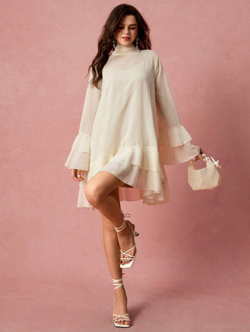 Step into chic with this Elegant Layered Stand Collar Dress! Featuring a sleek stand collar and stylish layered design, its solid color and long sleeves offer a perfect blend of sophistication and fun. Whether for a casual brunch or a night out, this dress keeps you looking effortlessly fashionable and comfy all day long. Ready, set, twirl!