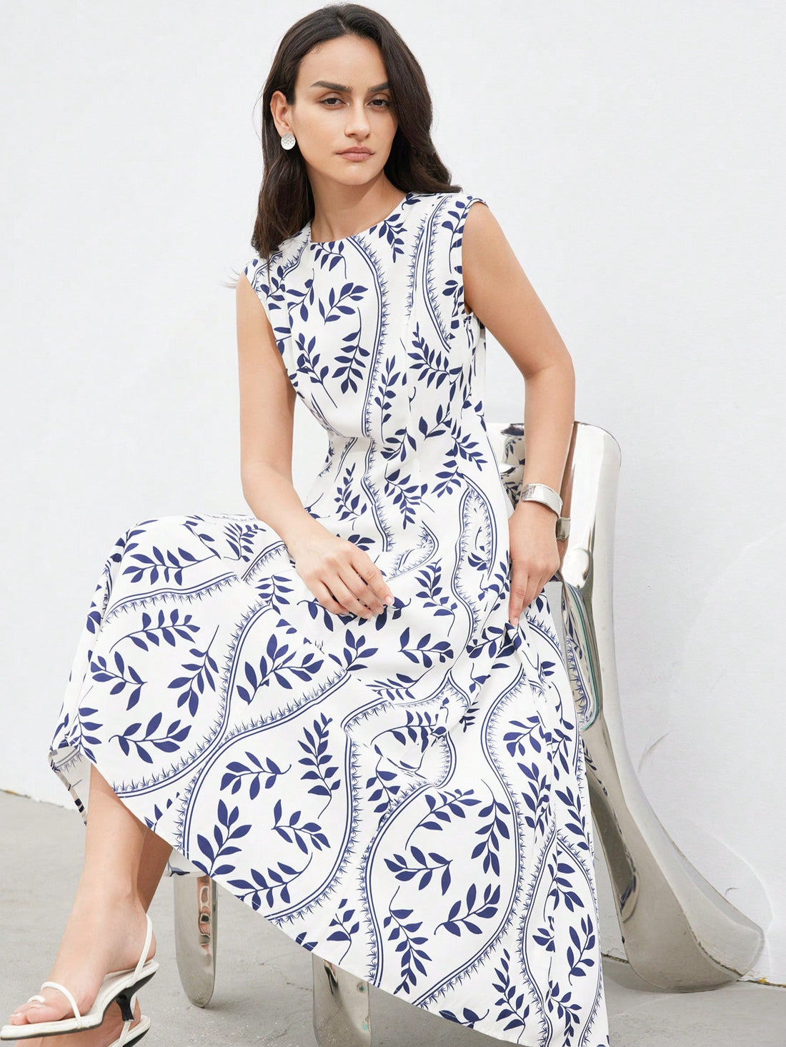 Step into effortless charm with this Elegant Leaf Print Dress. Featuring a playful flared hem and a minimalist round neck, it’s perfect for resort days or casual outings. The delicate leaf pattern adds a touch of nature-inspired fun, while the comfortable fit lets you move with ease and grace. Embrace a breezy, stylish look that’s as lively as your spirit.