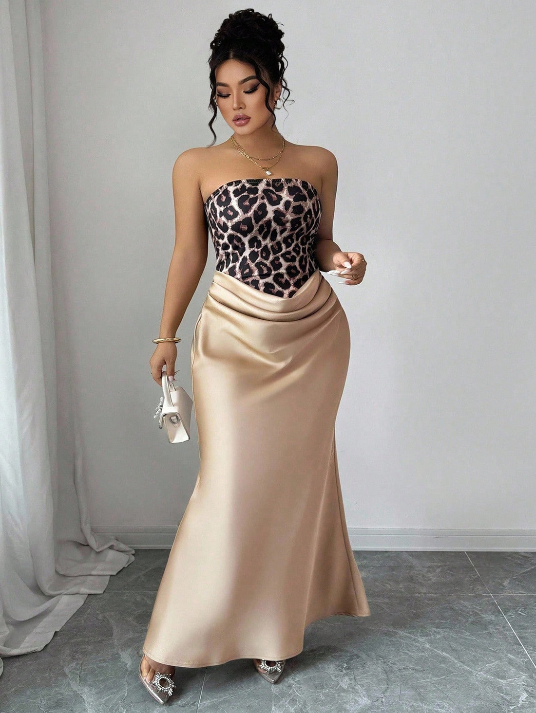 Turn heads at your next celebration in this stunning leopard print bodycon dress! The sleek silhouette hugs your curves in all the right ways, while the classic animal print adds a touch of wild sophistication. Perfect for Christmas parties, Halloween bashes, or any occasion calling for glamorous flair. The fitted design flatters your figure and moves with you, making it as comfortable as it is chic. Whether you're dancing the night away or making a grand entrance, this dress delivers instant style and conf